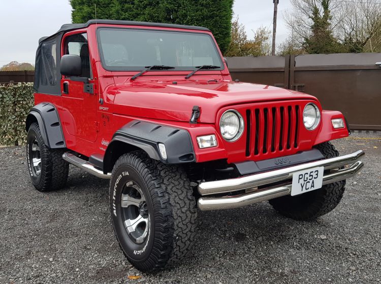now sold thanks!!!!!!Jeep Wrangler 4.0 auto Sahara jap import rust free soft top red 2003