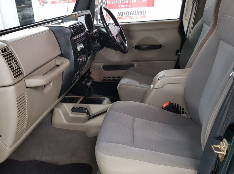 now sold thanks!!!!!!!!!Jeep Wrangler 4.0 auto Sahara green japanese import corrosion free 2003 fresh import in stock